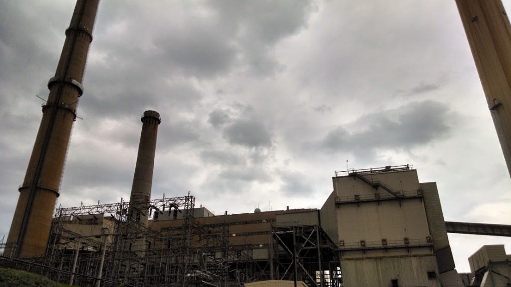 Thunderclouds gloom over the quiet power plant.  Photo by me.